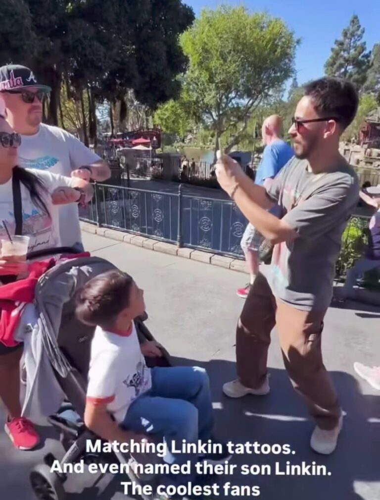 Mike Shinoda snapped a photo of a couple with matching “LINKIN” tattoos on their arms
